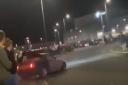 Video footage shows the drifting during the car meet at a roundabout in Peterborough