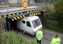 Caravan misjudges height and gets wedged under Stonea bridge