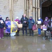 Ely Diocesan Mothers’ Union  stand together for 3 minutes to raise awareness for the 16 Days of Activism against gender-based violence