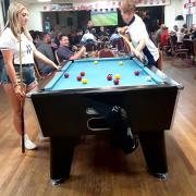 Leah and Damian share a game of pool at Littleport Ex-Servicemen’s Club