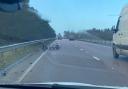 A number of bicycles have fallen off a roof rack on the A11