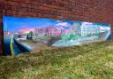 David Housden began painting a part of Wisbech town centre before it was hit by flooding in 1978, and now he has finished the artwork which stretches 16 feet in length.