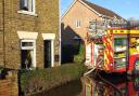 Emergency services pumping water out of a property in Gold Street, March, on Christmas Eve 2019.