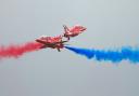 The Red Arrows crossover at the Flying Legends Air Show 2019 at IWM Duxford. The display team will appear at this year's 80th anniversary Duxford Battle of Britain Air Show weekend. Picture: Gerry Weatherhead