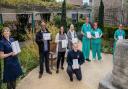 A dozen iPads have been delivered to Addenbrooke's Critical Care Unit in Cambridge after a fundraiser was launched in memory of firefighter Danny Granger, who was treated there. From back left: Jill Hyde, Mel, Katie, Margaret and critical care staff.