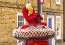 A secret yarn bomber has marked Valentine's Day in Ely by creating a knitted Snoopy.