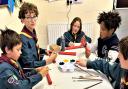 Littleport Scouts making props for The Littleport Players panto. From left: Jacob, Charlie, Gracie, Nathaniel and Jacob.