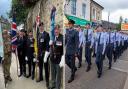 Standard bearers and cadets during the Ely Armed Forces Day parade