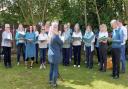 VocEly Community Choir performing at Lily House Care Home's picnic in the garden in June.