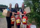 Scouts boost Ely Baby Bank with collection for their badge work