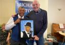 Ed Chivers presented Micheal Antony with the picture he had painted of him.