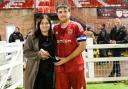 Man of the match Ely captain Dom Hunt with sponsor Natasha Lane.