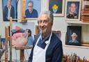 Photo shows John 'Harry' Thurley in his Ely-based workshop surrounded by examples of his work