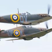 A Spitfire and Hurricane flying together at the IWM Duxford showcase day on Tuesday, August 4. Picture: Gerry Weatherhead