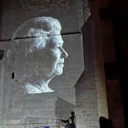 An image of Queen Elizabeth II is projected onto St Andrew's Church in Sutton as the village paused to reflect on the Queen's life.