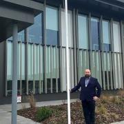 CCC chairman, Cllr Stephen Ferguson, with the Ukraine flag at Aloconbury Weald.