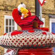 A secret yarn bomber has marked Valentine's Day in Ely by creating a knitted Snoopy.