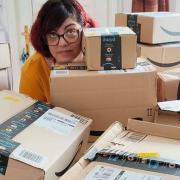 In February, Ely Foodbank was 'overwhelmed' by 650kg of donations. Social media admin Georgie's home was the delivery address for the wishlist donations. She is pictured hiding amongst the boxes which took over her whole kitchen and living room.