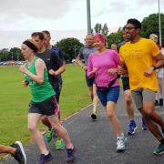 Reverend Natalie Andrews, the vicar of St George's Parish Church in Littleport,  is pictured (wearing pink) at Littleport parkrun in January.