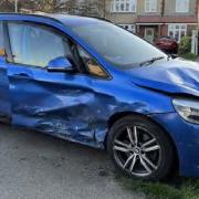 The BMW was forced off the road, onto the pavement, and into a telegraph pole.