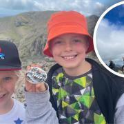 Adam and Elliot Brennand scaled the tallest mountain in England in memory of their friend Janet Rogers on June 22