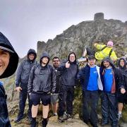 The Turners team at the top of Mount Snowdon