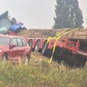 Police were called to a collision between a car and a tractor on Lynn Road at 9.52am.