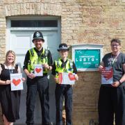 Pip Gardner from The Kite Trust (R) is pictured with Harriet from East Cambs CSP and representatives of East Cambs Police