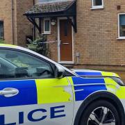 A house in John Amner Close, Ely, was taped off on Thursday September 26 following the discovery of a human bone in a garden on September 24.