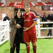 Man of the match Ely captain Dom Hunt with sponsor Natasha Lane.