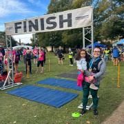 Chloe Gosling - with her daughter Aria-Rose - after completing the race