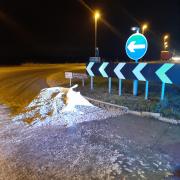 A lorry split on the A142 causing cockles to spill across the road.