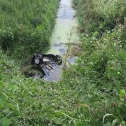 The car flipped into a water-filled ditch in Littleport.