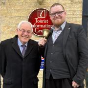 Mayor Cllr Chris Phillips stands with Matthew Routledge, Town Crier, outside of Oliver Cromwell’s House.