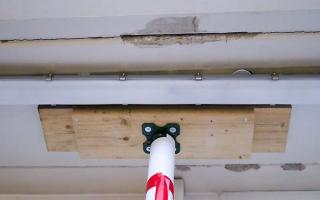 Support beams hold parts of the ceiling up in the Queen Elizabeth Hospital