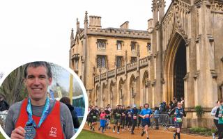 Philip Scurrah holding his medal after getting his personal best at the TTP Cambridge Half Marathon.